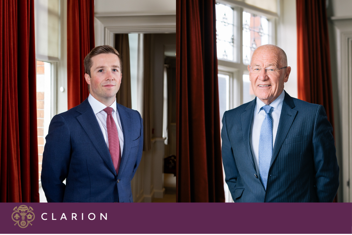 John Winstanley and Keith Thompson in suits in the Clarion Wealth Planning offices