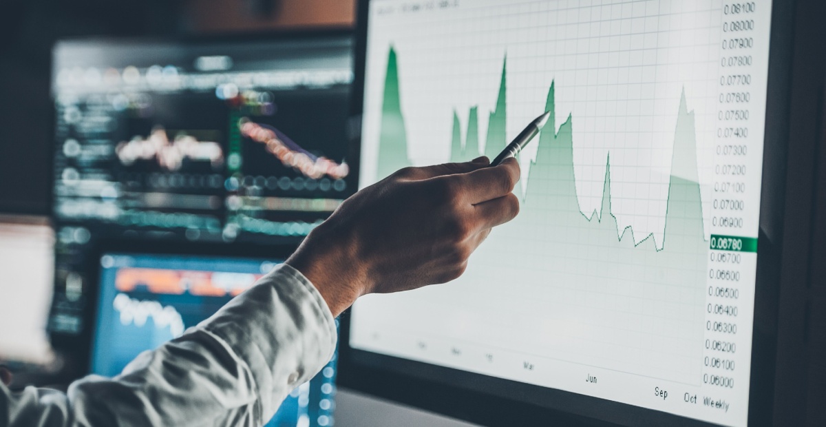 Someone pointing at an index on a screen.
