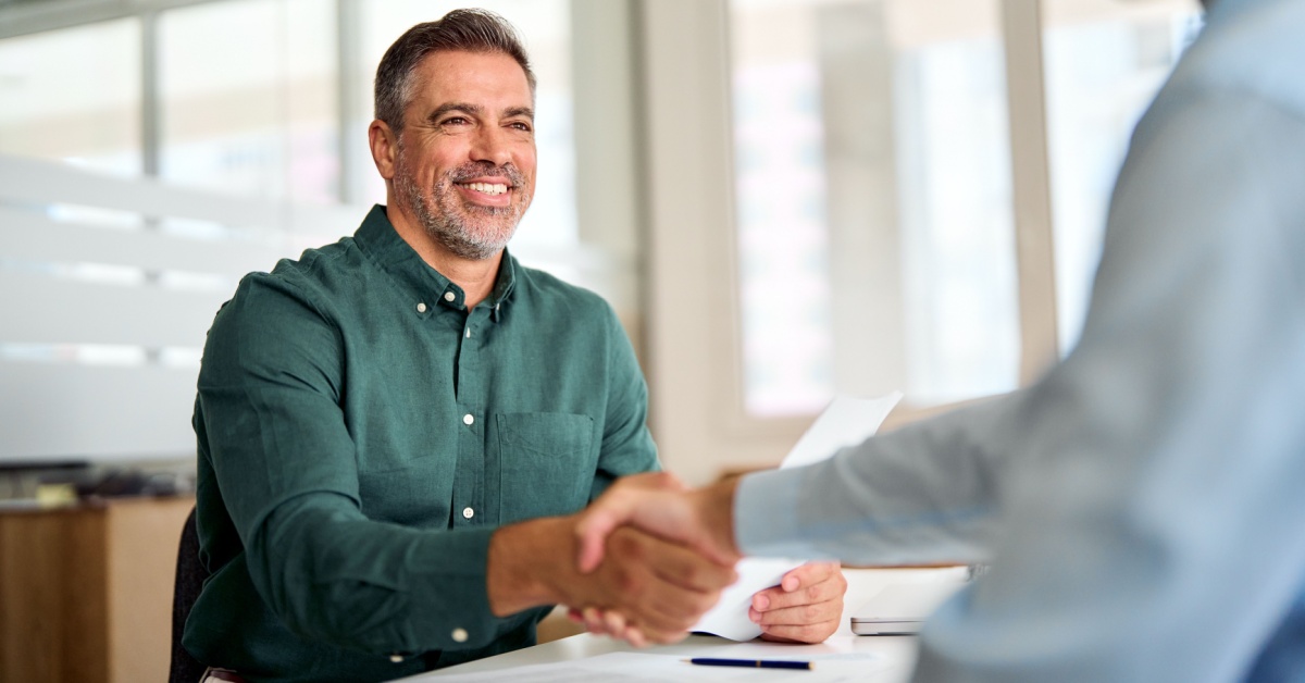 Two businessmen shaking hands
