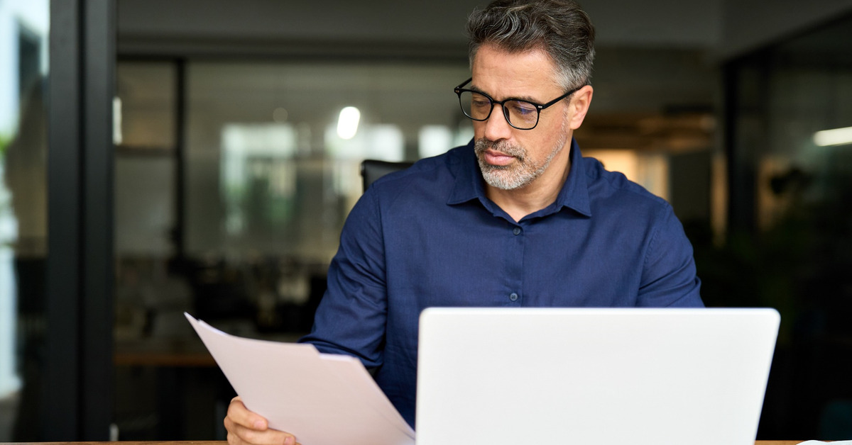 A businessman reading documents